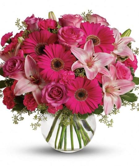Youthful. Graceful. Beautiful. These are just a few qualities that come to mind when gazing at a gorgeous bouquet of pink flowers. Whether you want this arrangement to say "Happy Anniversary" or "Happy Any Day," you can be sure the day it arrives will be brighter for anyone lucky enough to receive it.