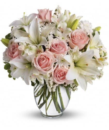 This beautiful bouquet will most certainly arrive in style! A delightful combination of light colors and lovely flowers, it's simply beautiful. To include Pink Roses, White Lilies , White Alstroemeria 